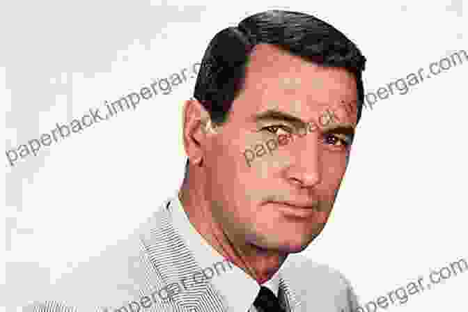 A Captivating Photograph Of Rock Hudson In A Tuxedo, His Piercing Blue Eyes Gazing Directly At The Camera. Rock Hudson FBI Files (The Full F B I Vault File)