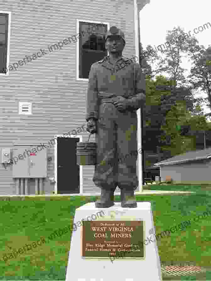 A Memorial To Coal Miners, With A Statue Of A Miner Holding A Lamp DOWN IN A MINE OR BURIED ALIVE