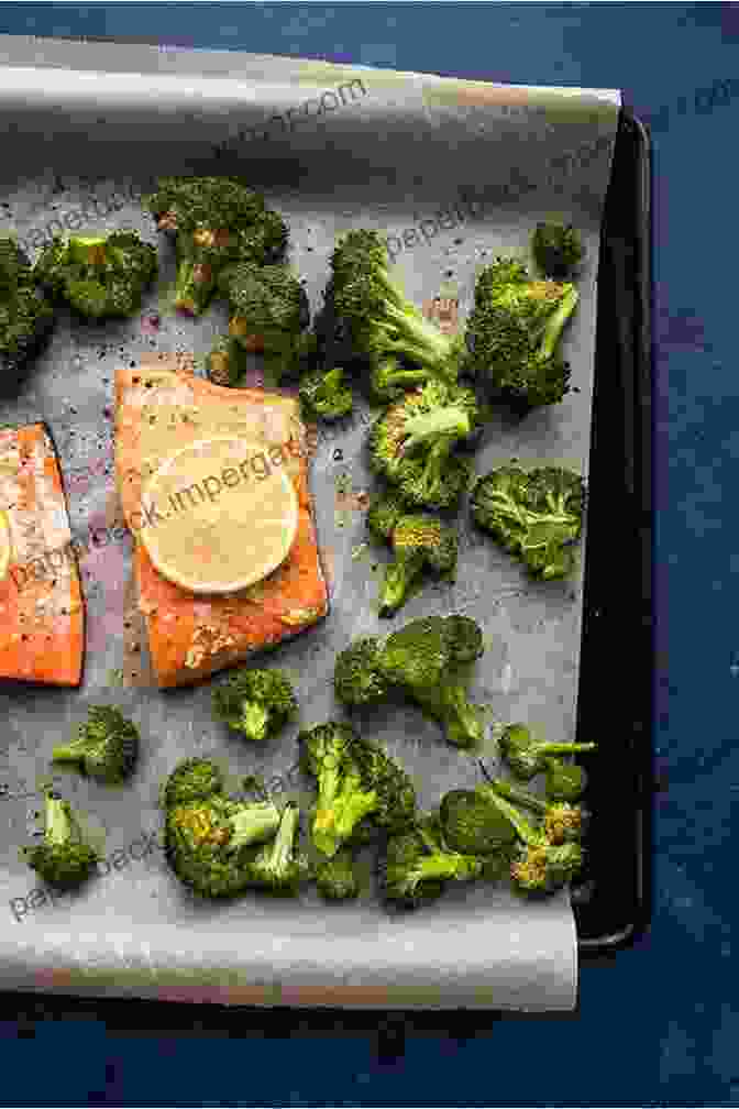 Salmon With Roasted Broccoli And Cauliflower PALEO DIET PLAN: 7 Day Paleo Diet Plan For Weight Loss: Burn Fat Lose Weight And Improve Your Health With The Ultimate Paleo Diet Meal Plan: Enjoy 35 Recipes For Every Day (PALEO WORLD 3)